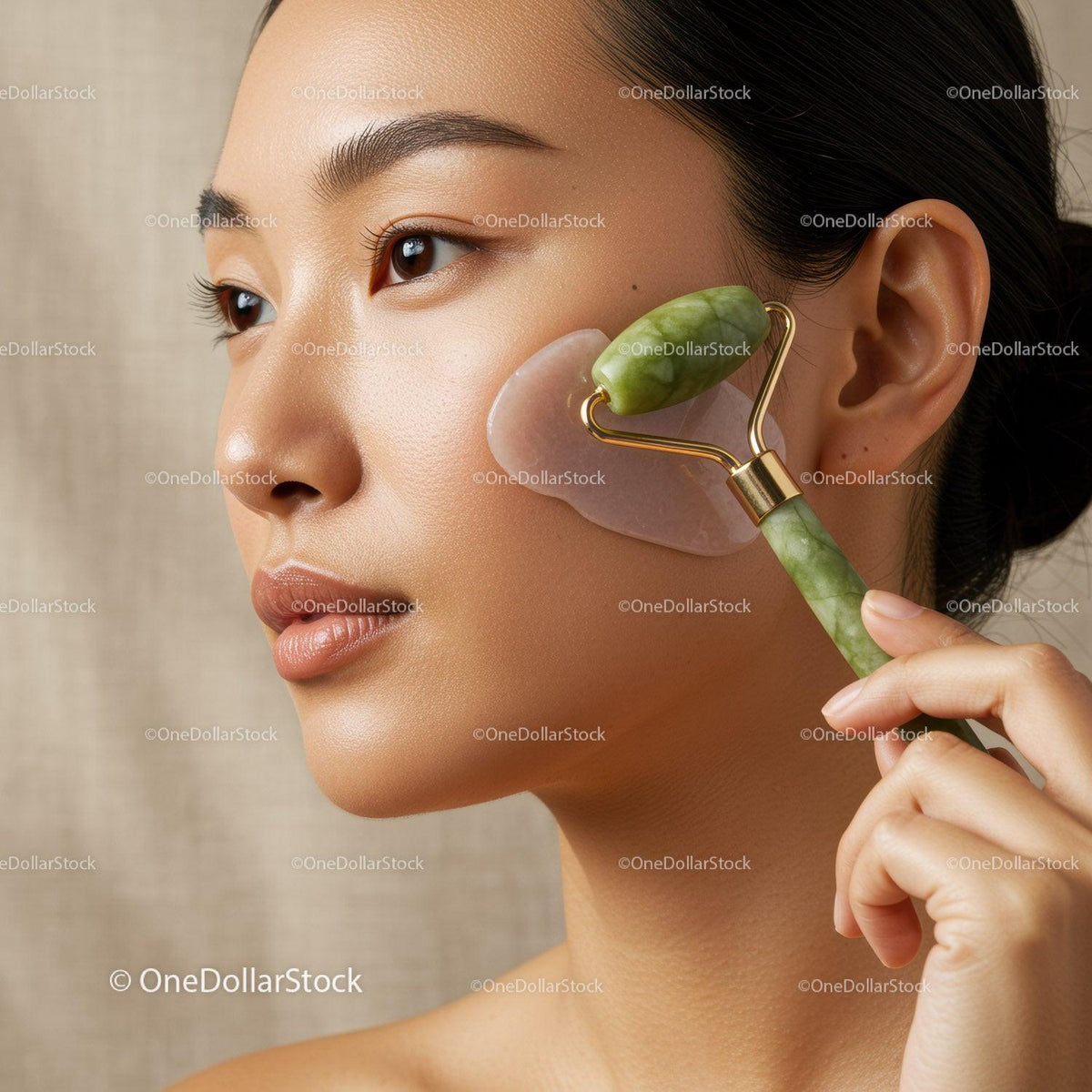 Woman Receiving Facial Massage with Jade Roller for Glowing Skin