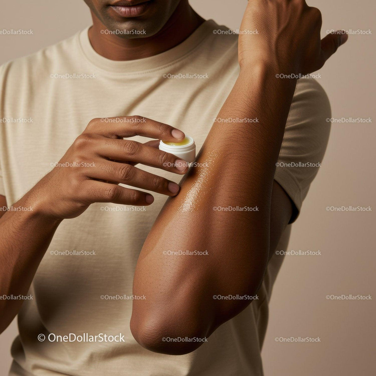 Close-Up of Man Applying Body Lotion for Skin Hydration