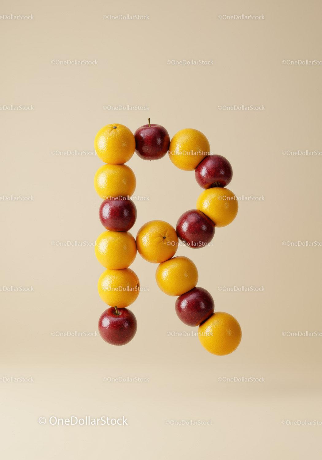 Letter R formed with apples and oranges on beige background