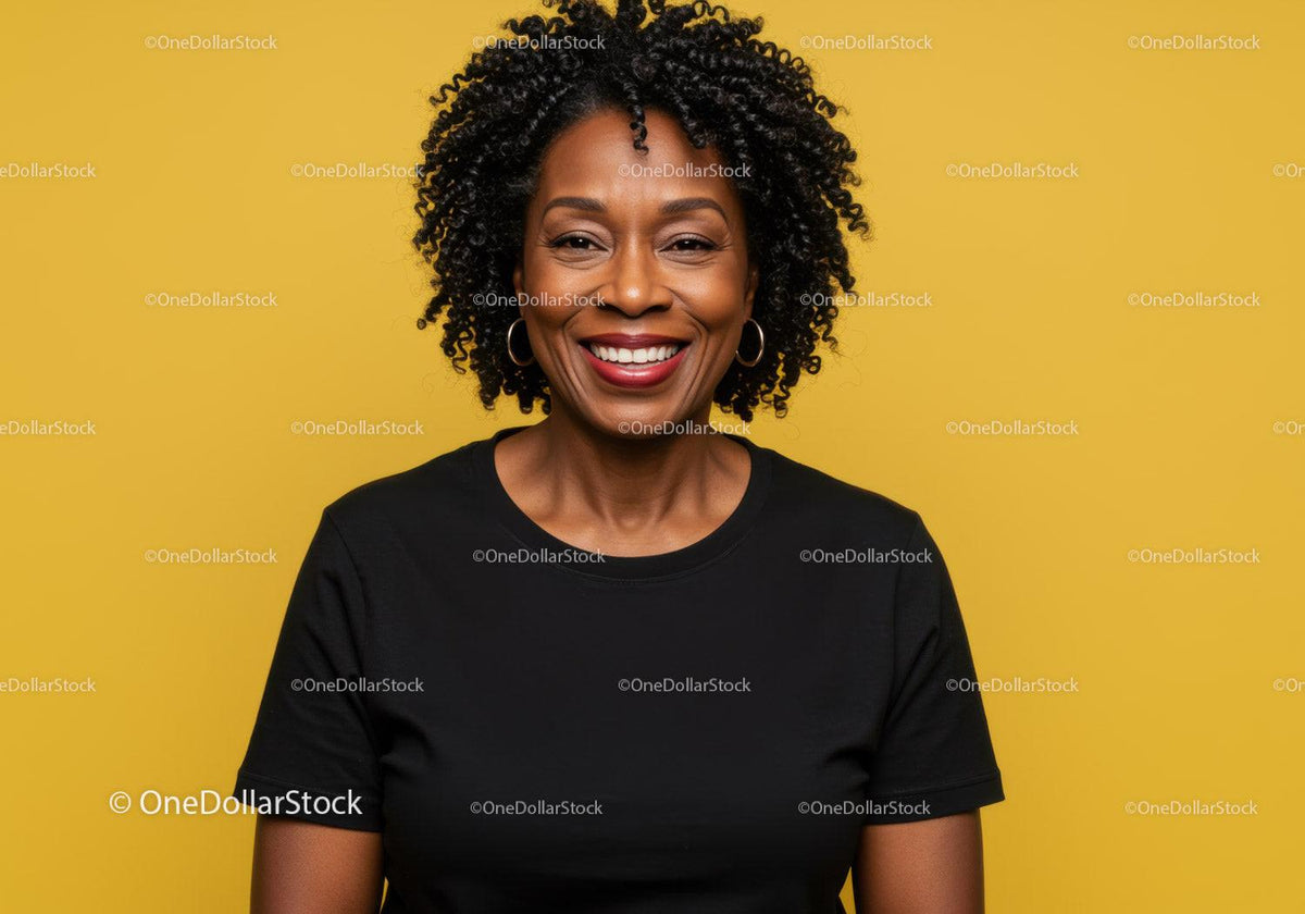 Confident Smiling Woman with Curly Hair in Black T-Shirt on Yellow Background