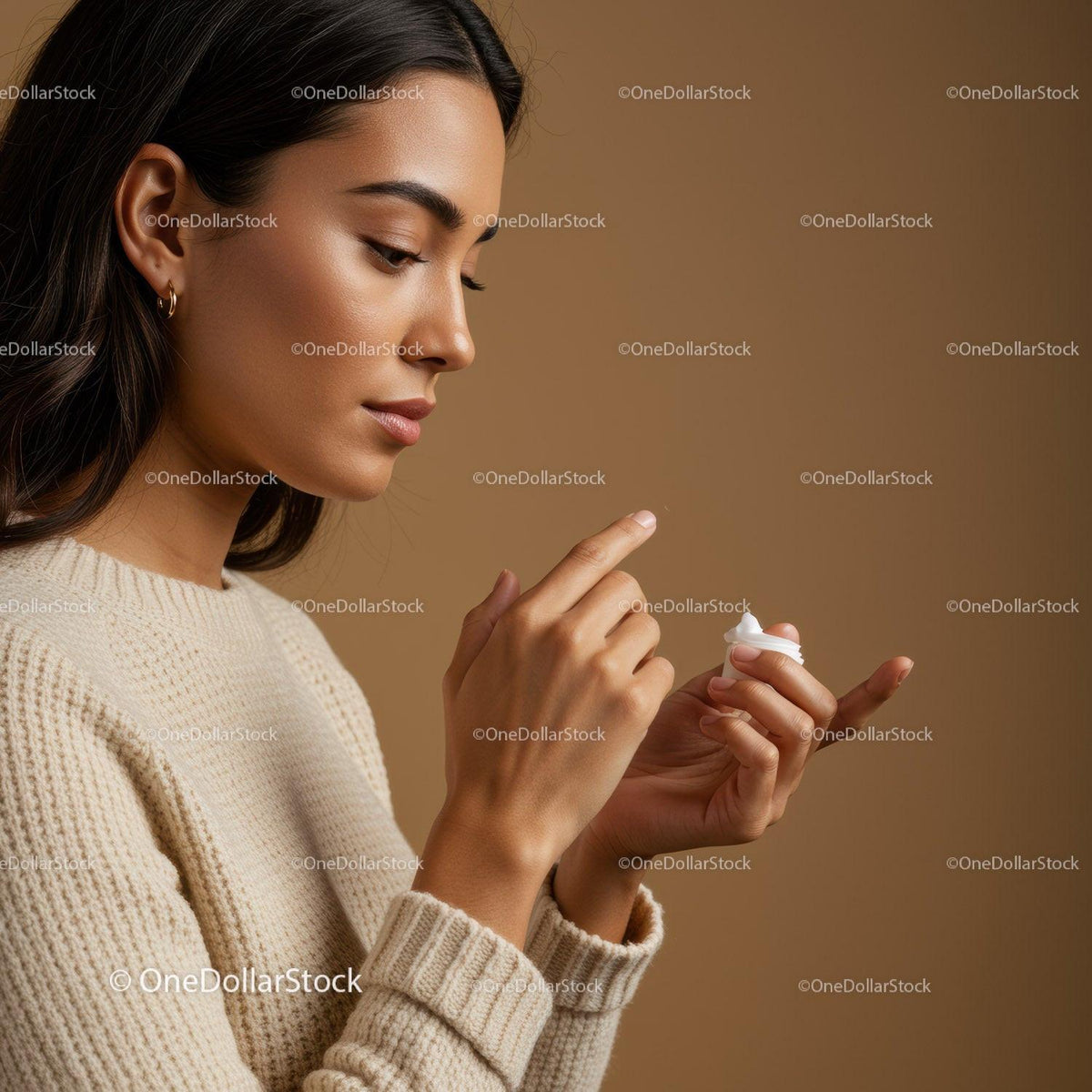 Woman Applying Skincare Cream for Healthy Glowing Skin