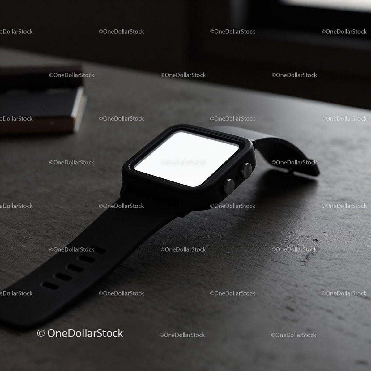 Modern black smartwatch resting on dark textured surface JPG Mockup Image preview