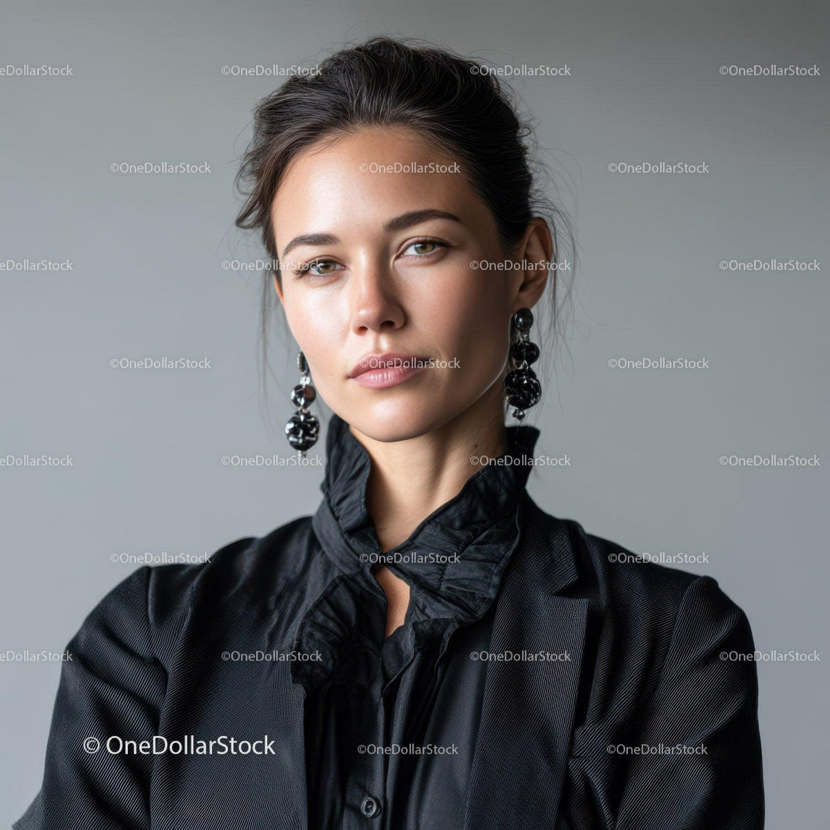 Elegant Woman Portrait in Black Satin Blouse and Statement Earrings