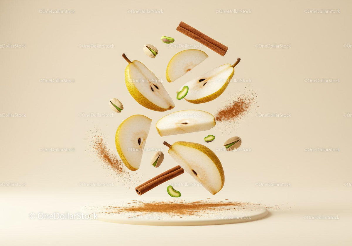 Fresh pear slices with cinnamon and pistachios floating