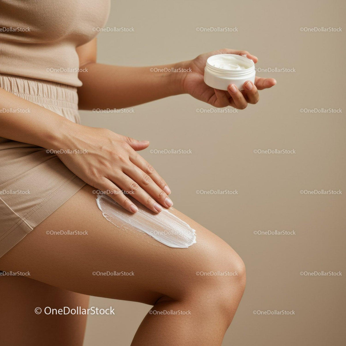 Woman Applying Body Lotion with Skincare Jar in Minimalist Setting