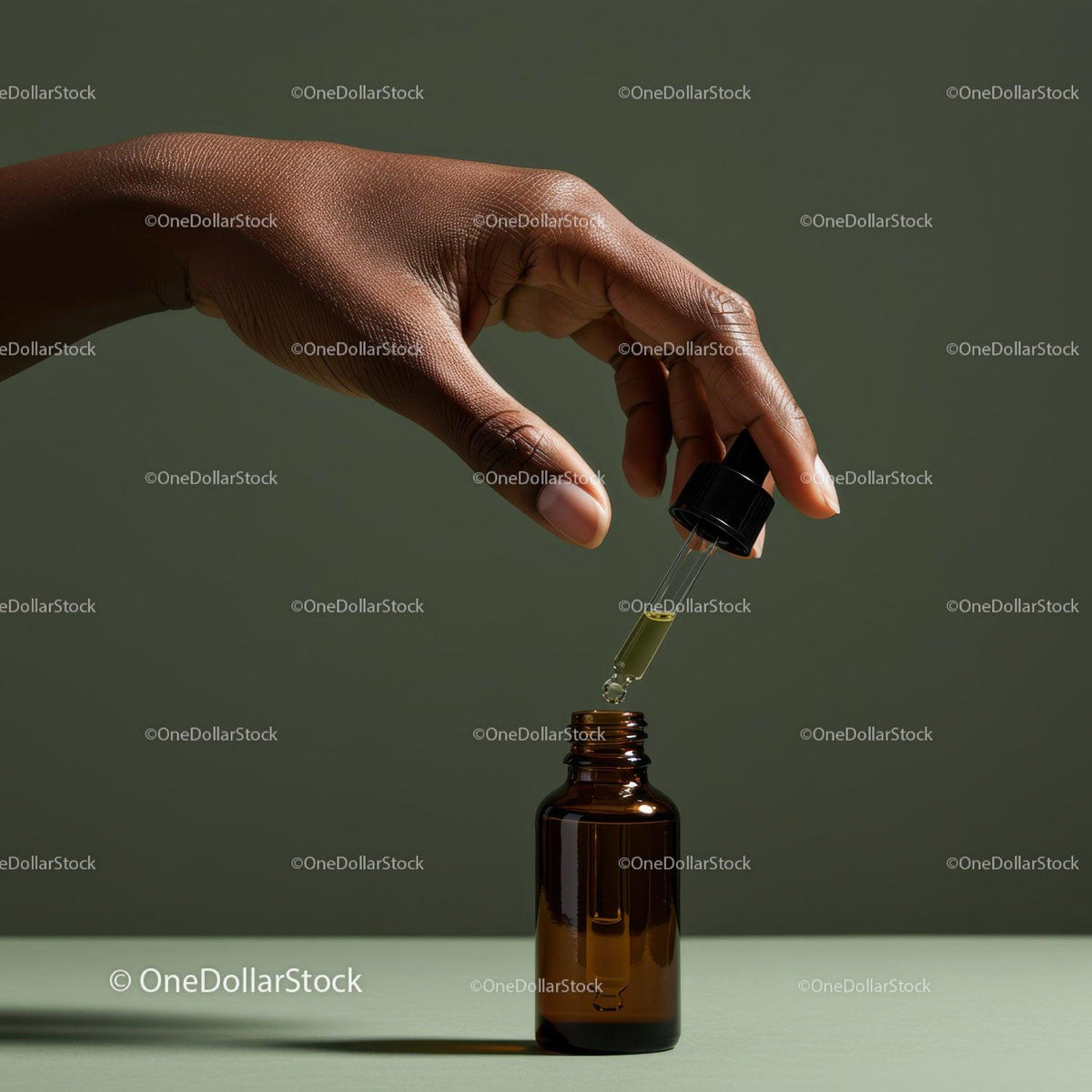 Hand Holding Dropper Filling Amber Glass Bottle for Skincare JPG Mockup Image preview
