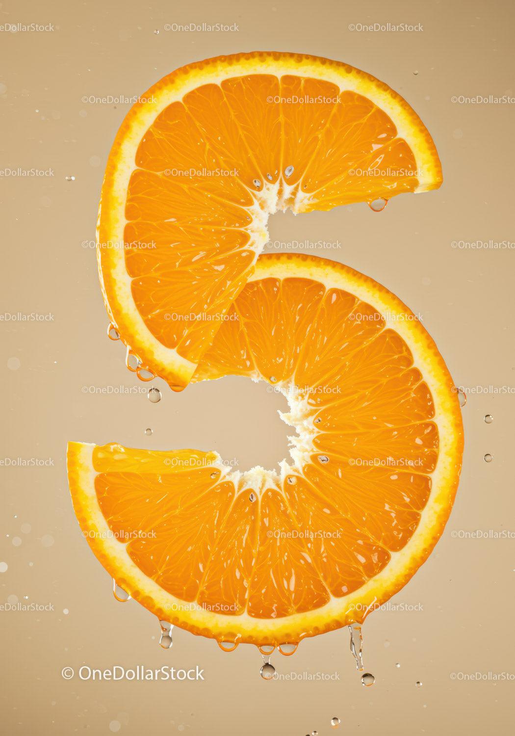 Fresh Orange Slices Forming Number Five with Water Droplets