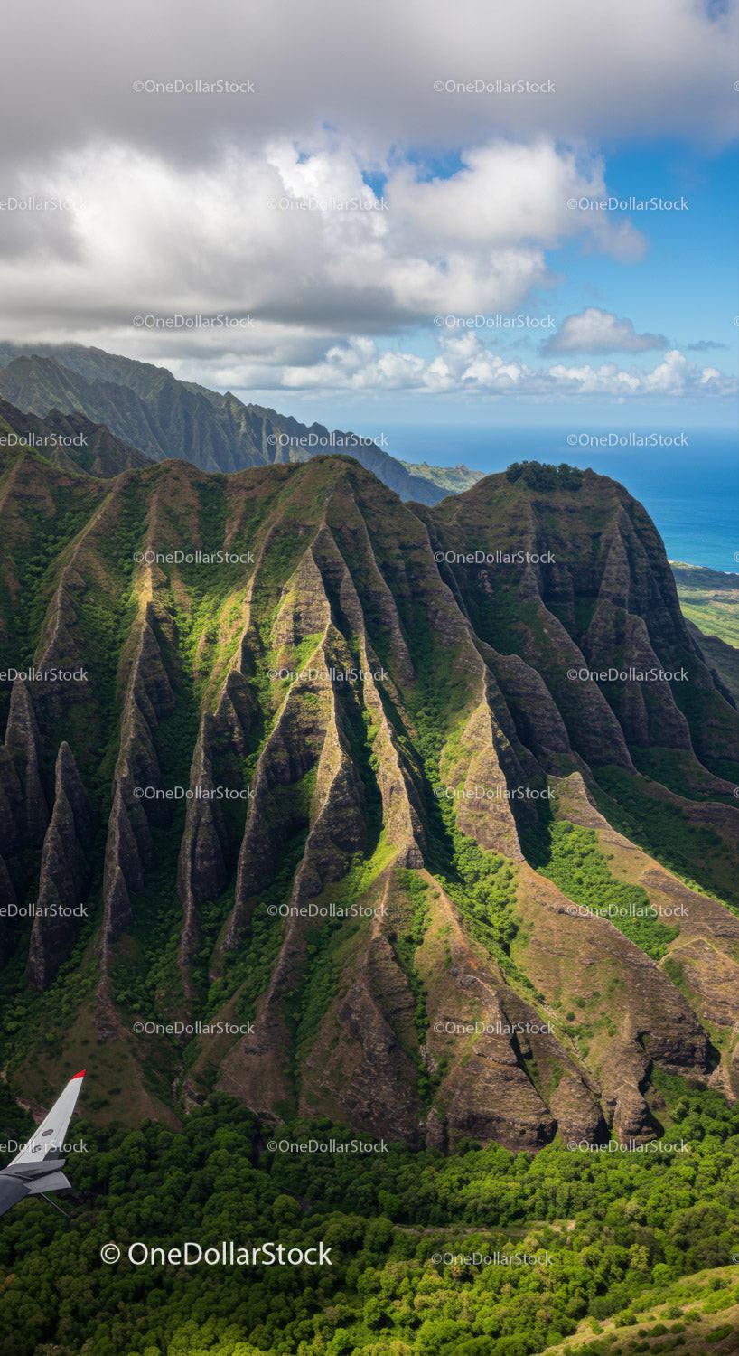 Majestic Green Mountain Range with Rugged Cliffs and Coastal Horizon