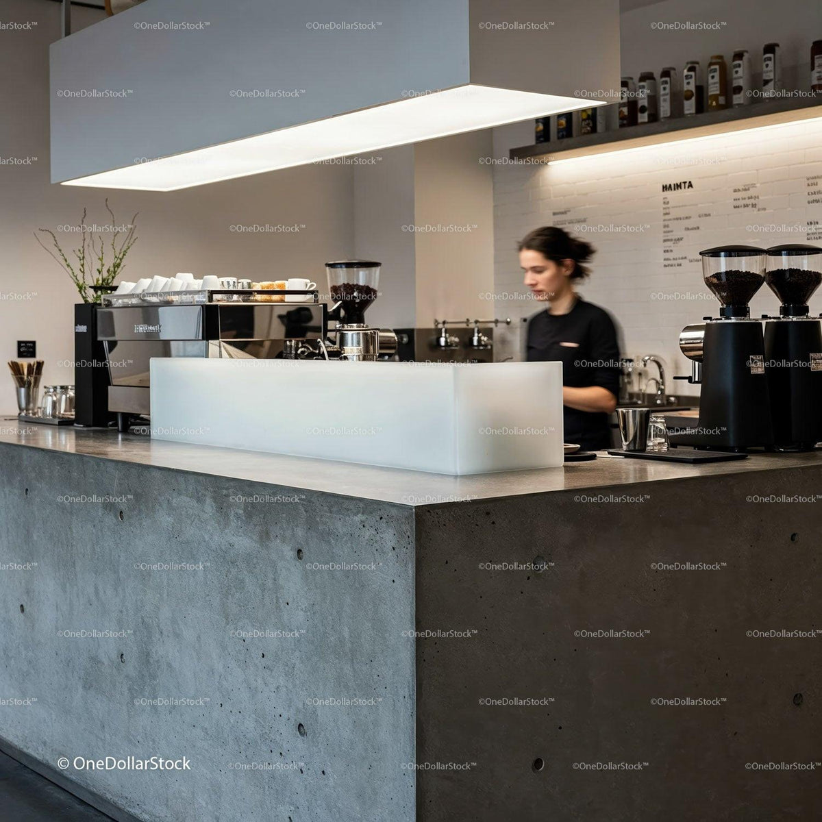 Barista preparing coffee behind modern concrete counter JPG Mockup Image preview