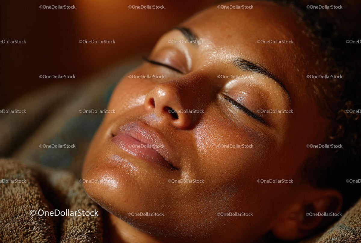 Close-Up of Relaxed Woman with Glowing Skin and Peaceful Expression
