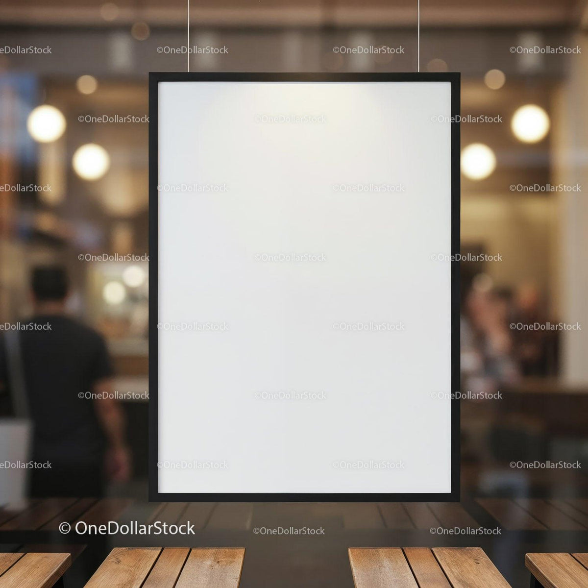 Blank black framed poster hanging indoors in cafe JPG Mockup Image preview