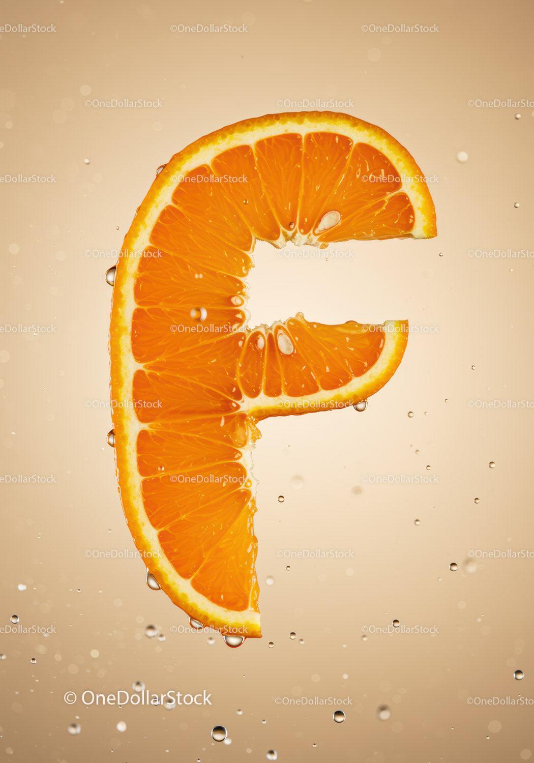 Fresh orange slice shaped like vitamin C symbol