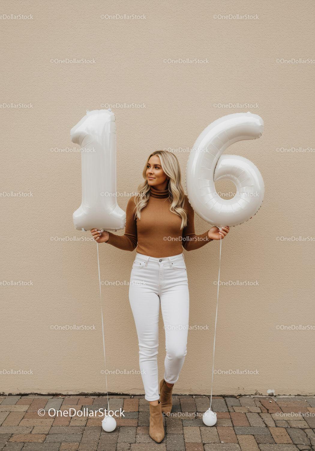 Young woman celebrating sweet sixteen with balloons