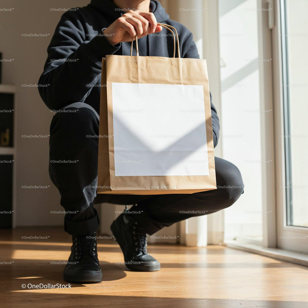 Person Holding Brown Paper Shopping Bag Indoors JPG Mockup Image preview
