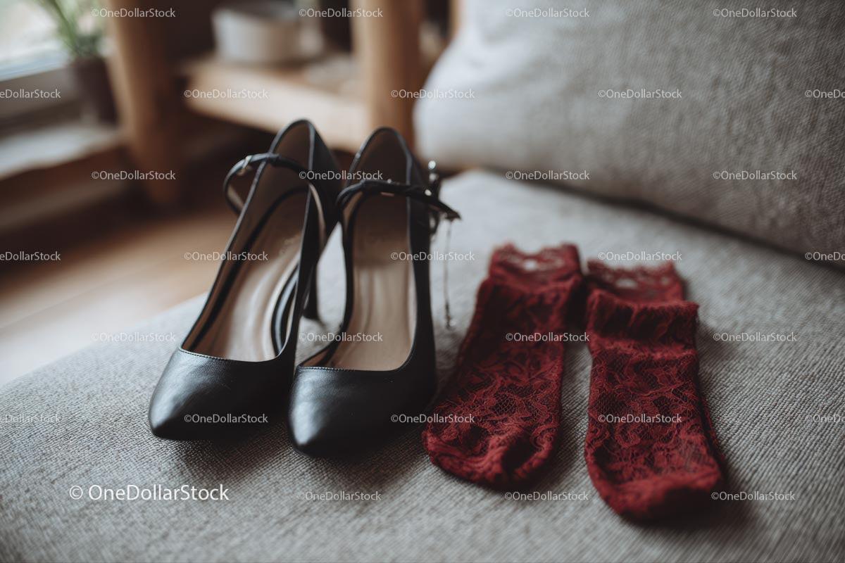 Chic Black Heels and a Red Lace Dress in a Cozy Bedroom Setting Stock Photo Bundle preview 6