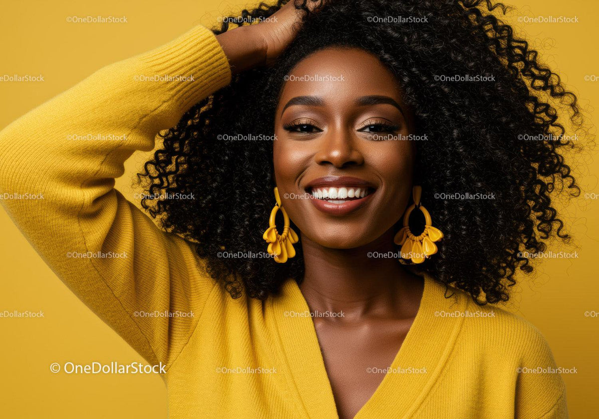 Portrait of a Smiling Woman with Curly Hair Wearing Yellow Fashion