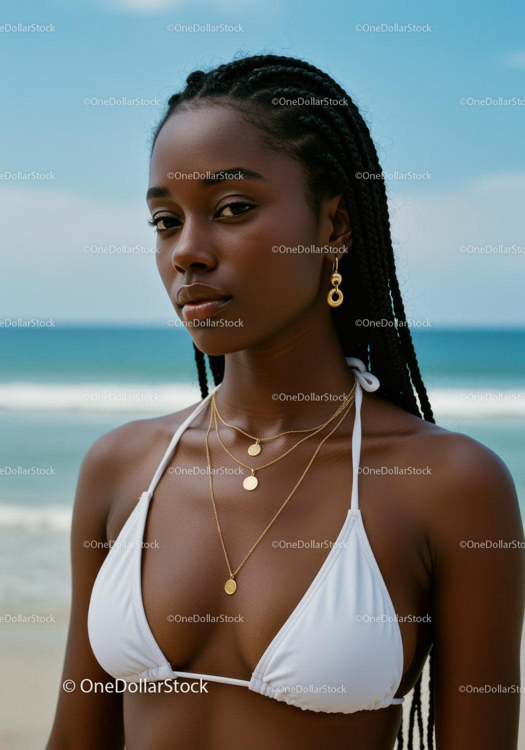 Elegant Woman in White Bikini with Gold Jewelry at the Beach