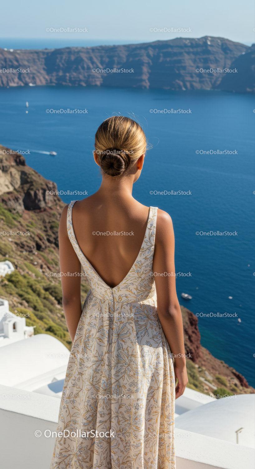 Woman in Floral Dress Overlooking Mediterranean Sea View