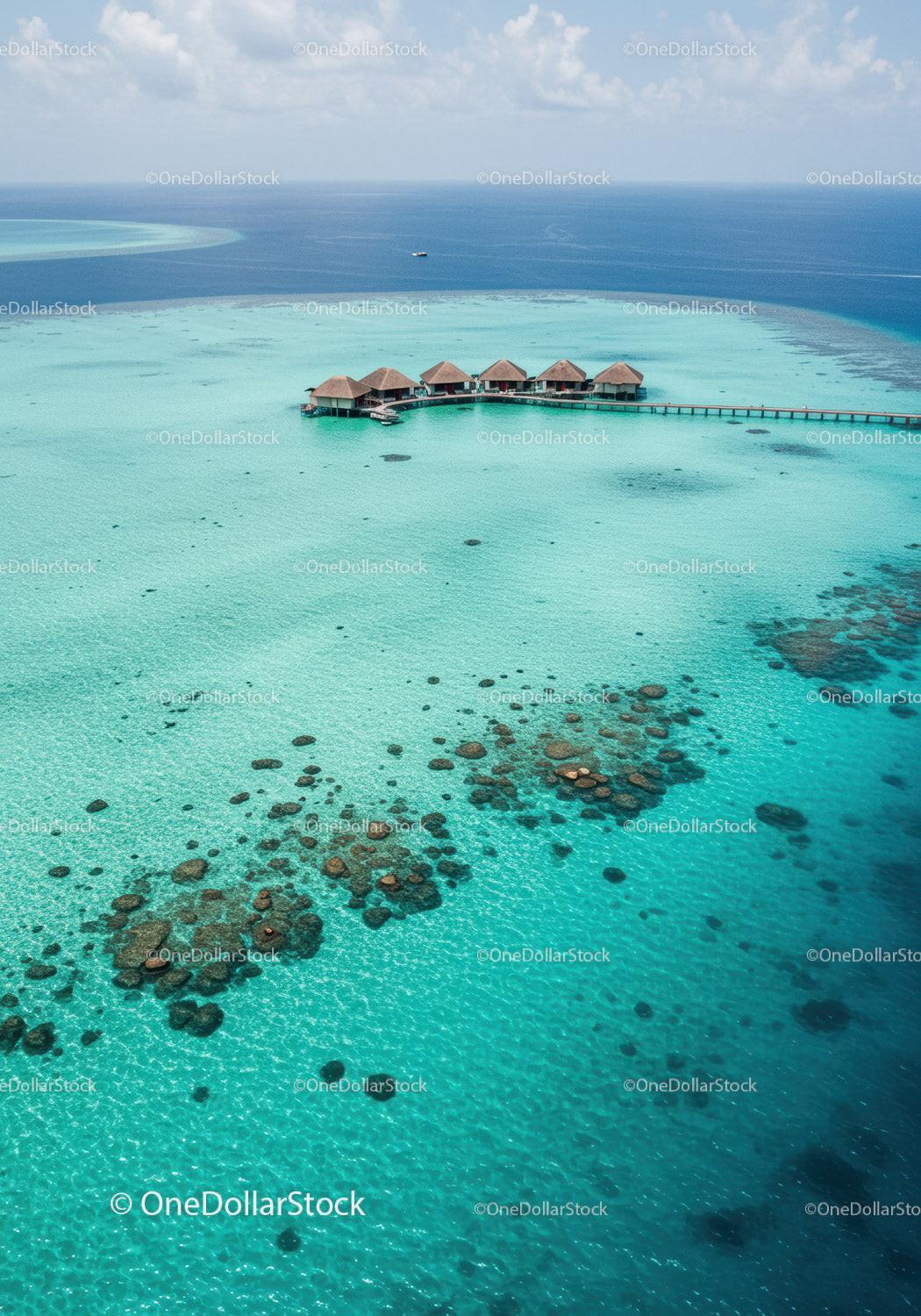 Overwater Bungalows on Tropical Island with Clear Turquoise Water