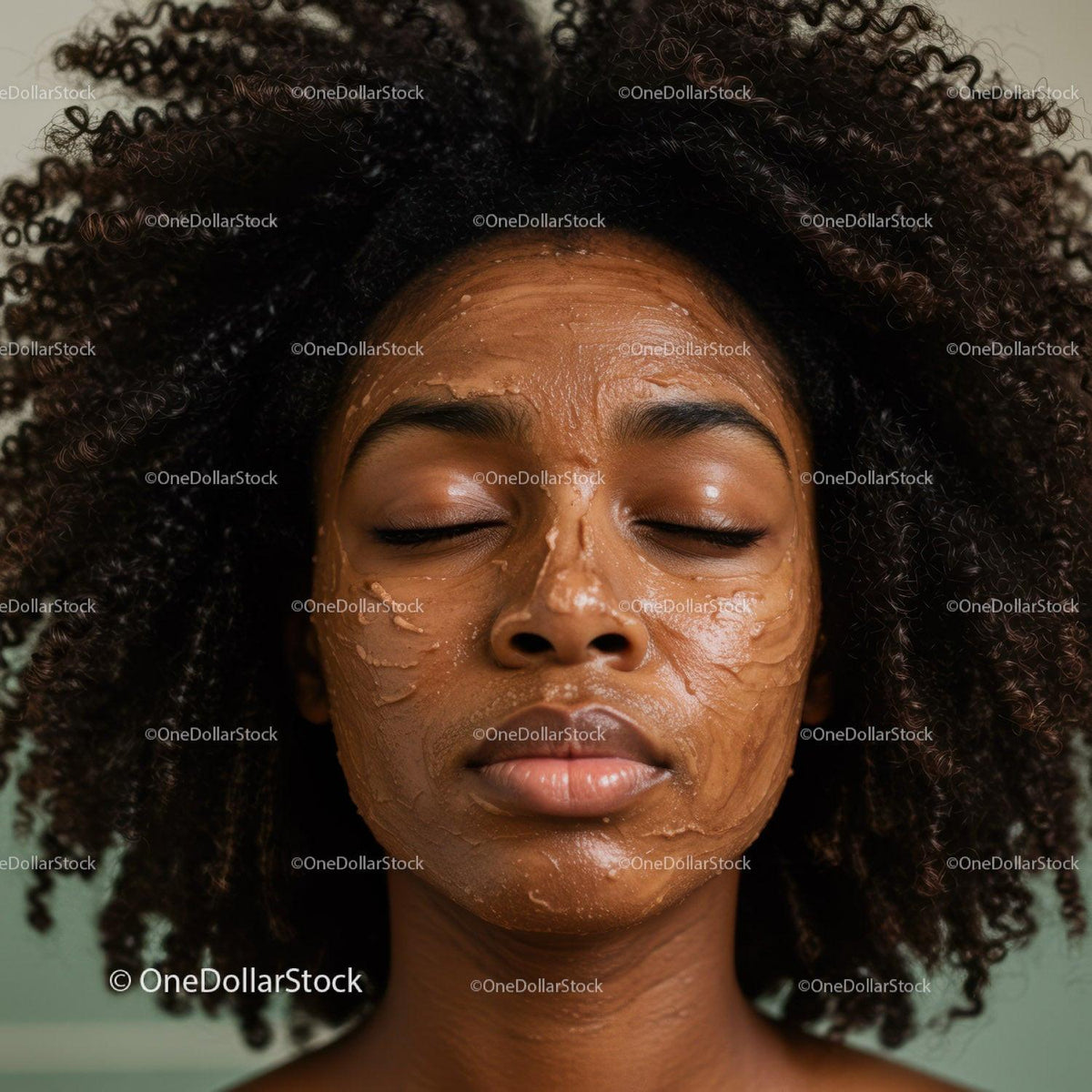 Young Woman With Curly Hair Relaxing During Face Mask Skincare Treatment