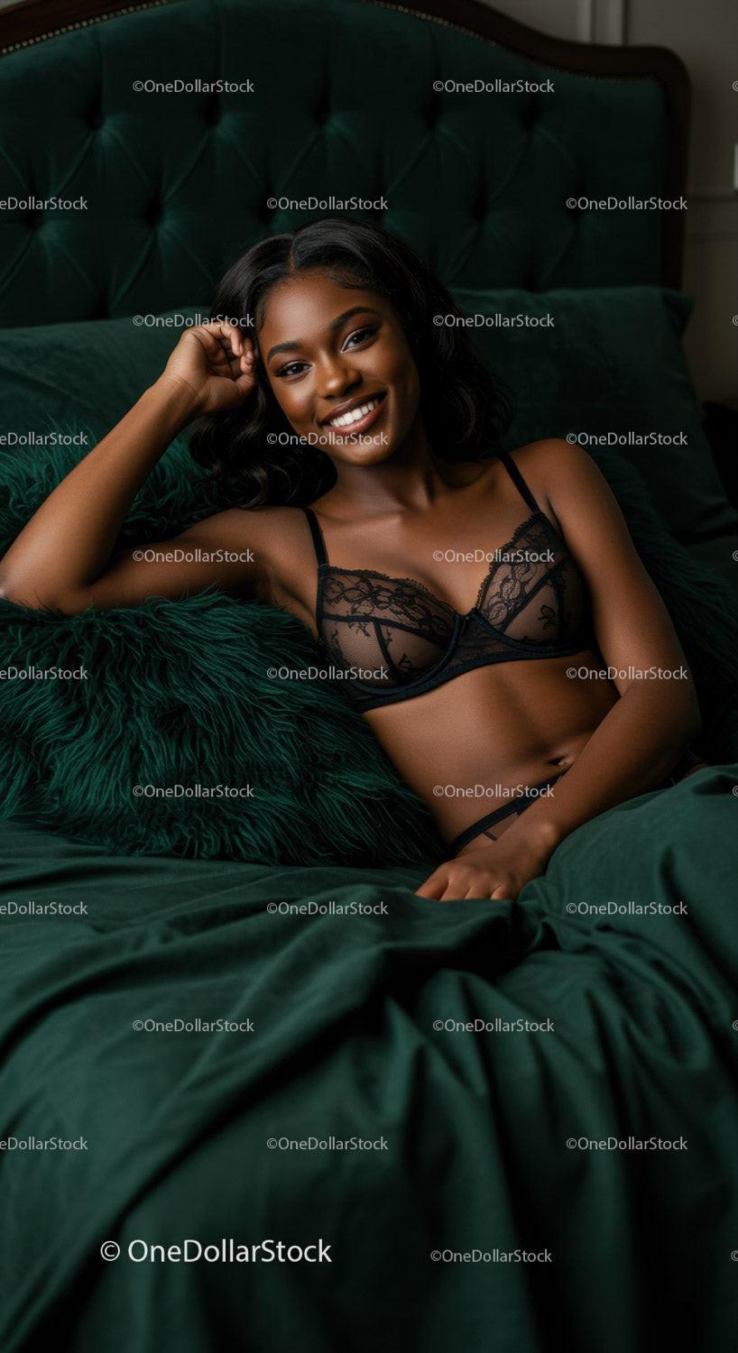 Smiling woman relaxing on emerald green velvet bed
