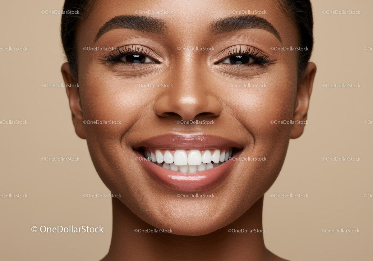 Close up of smiling woman with flawless skin and white teeth