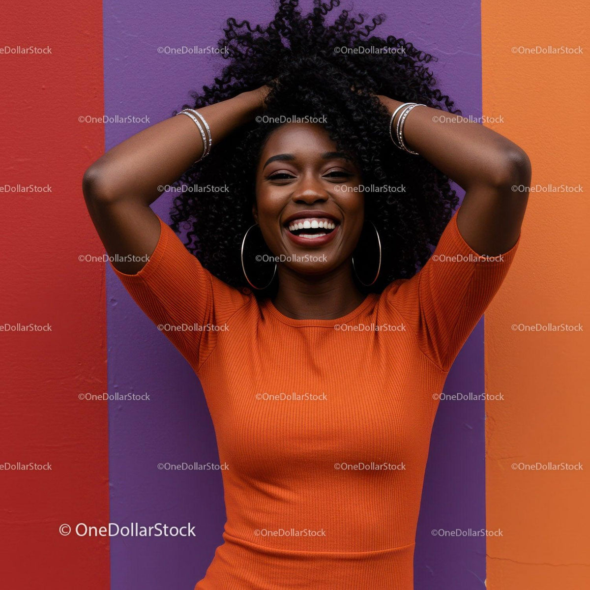 Vibrant Smiling Woman with Curly Hair Wearing Orange Top Against Colorful Wall