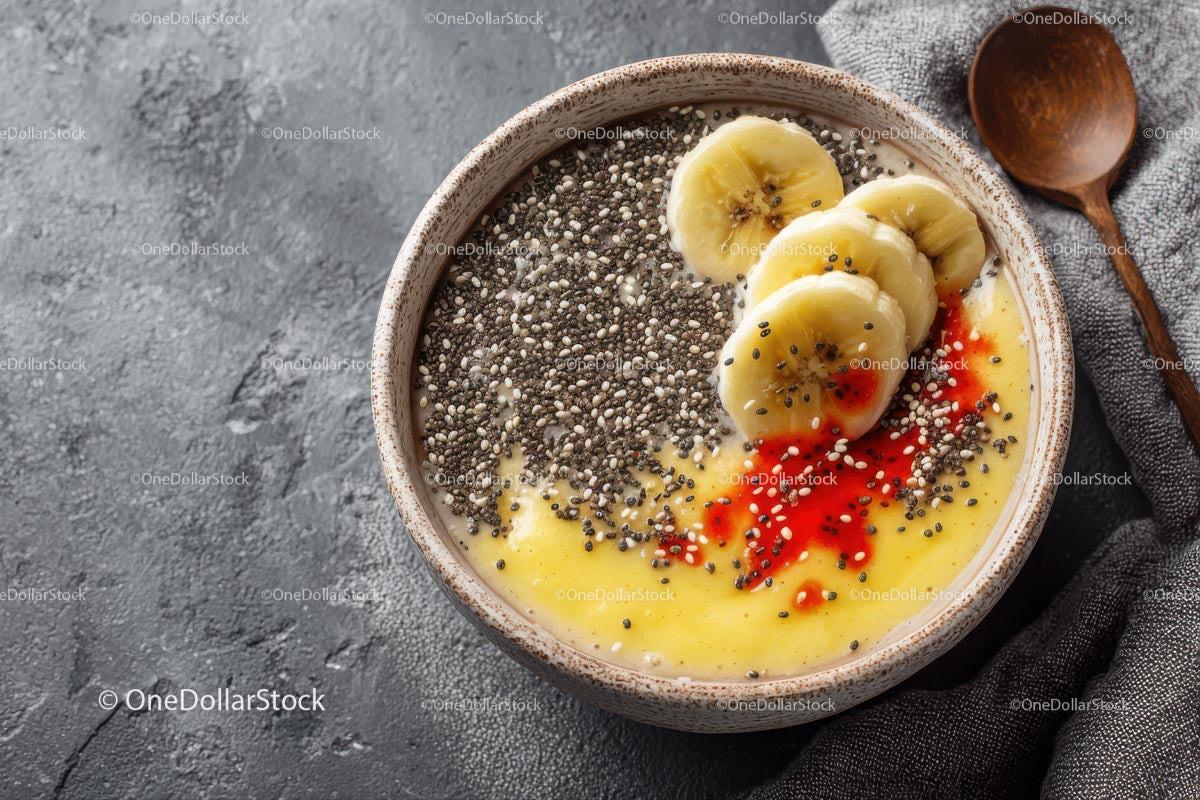Delicious Tropical Smoothie Bowl with Banana and Chia Seeds Stock Photo Bundle preview 6