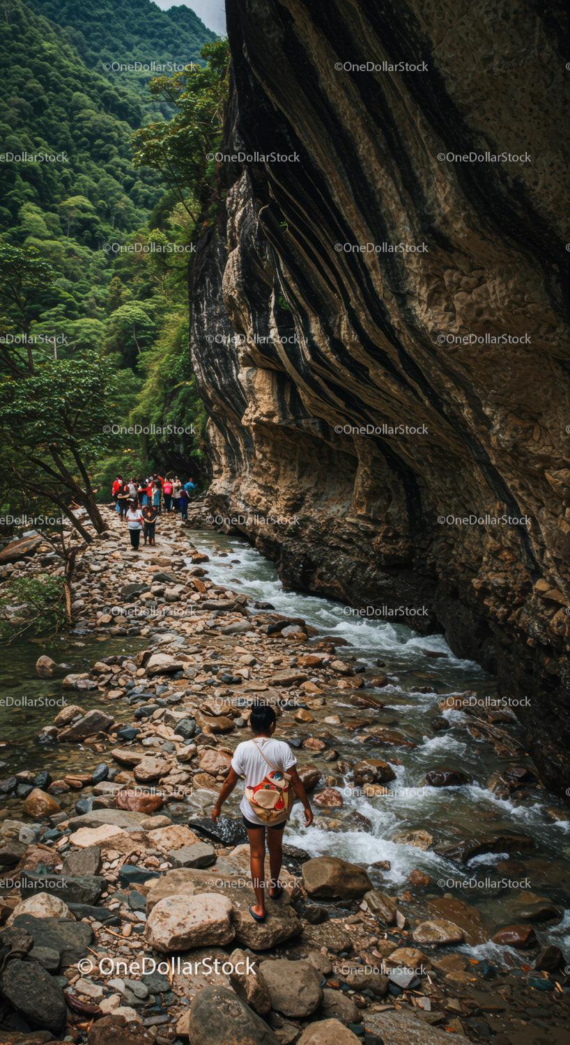 Spectacular Mountain Canyon with River and Hikers Exploring Scenic Outdoors