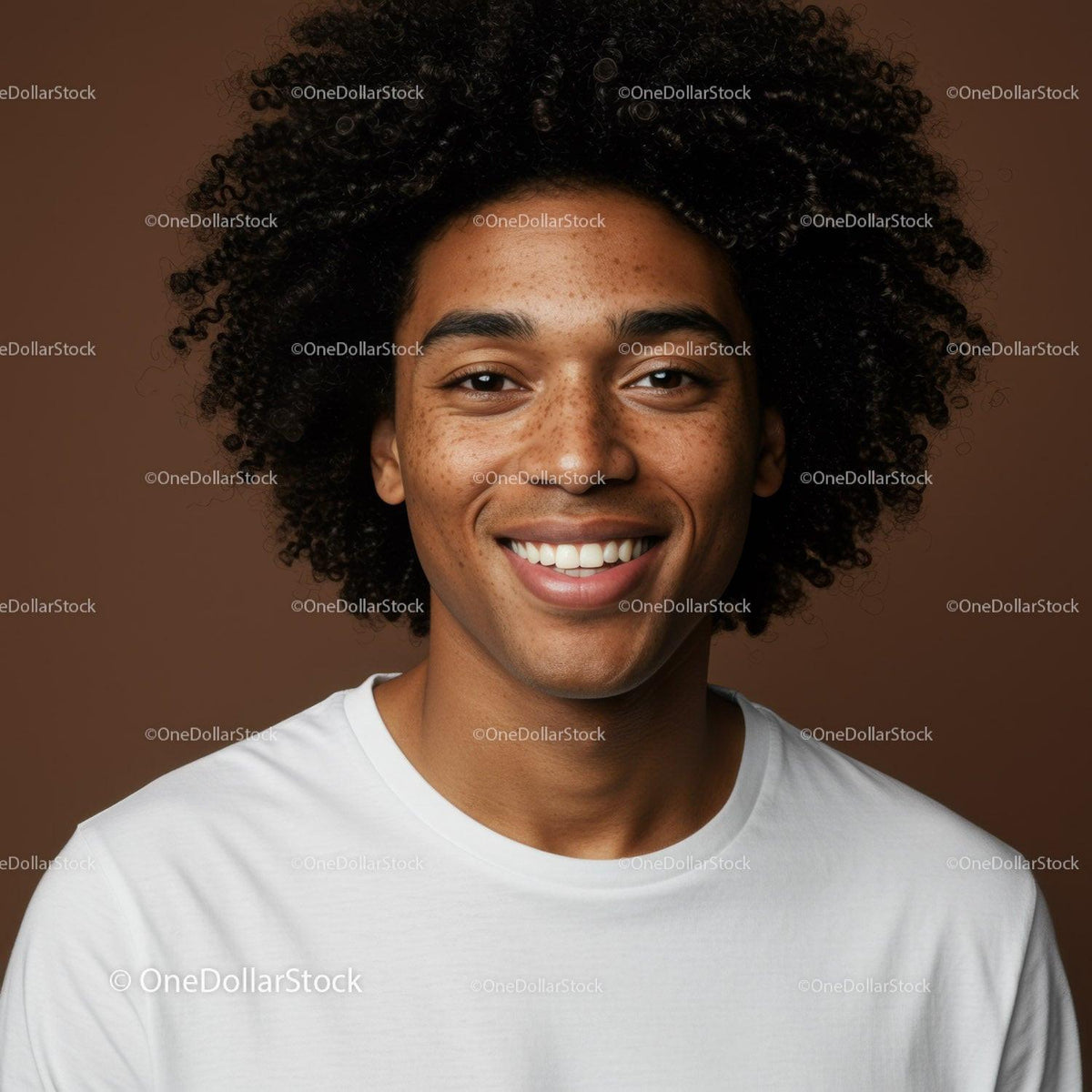 Portrait of a Smiling Woman with Curly Hair and Freckles in Natural Lighting