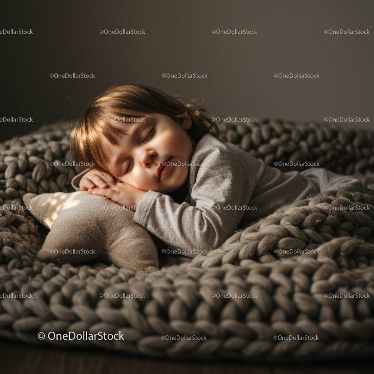 Peaceful toddler sleeping on soft knitted blanket