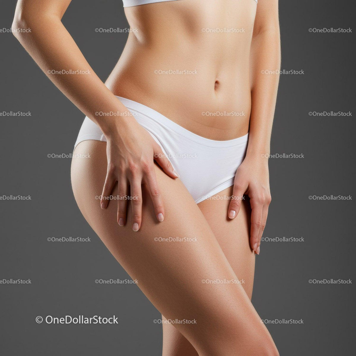 Confident Woman in White Underwear Showcasing Skin Care and Fitness