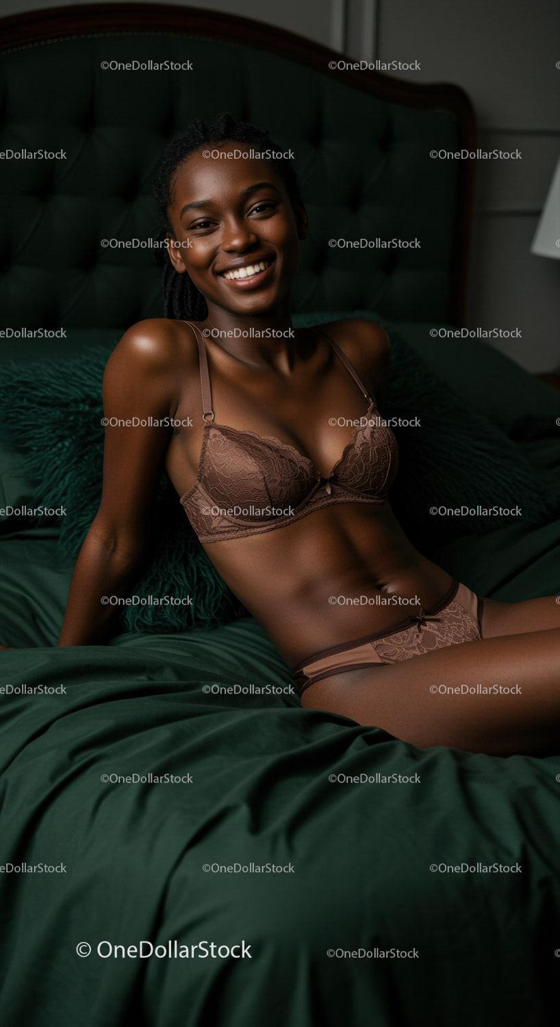 Smiling woman relaxing on green velvet bed indoors