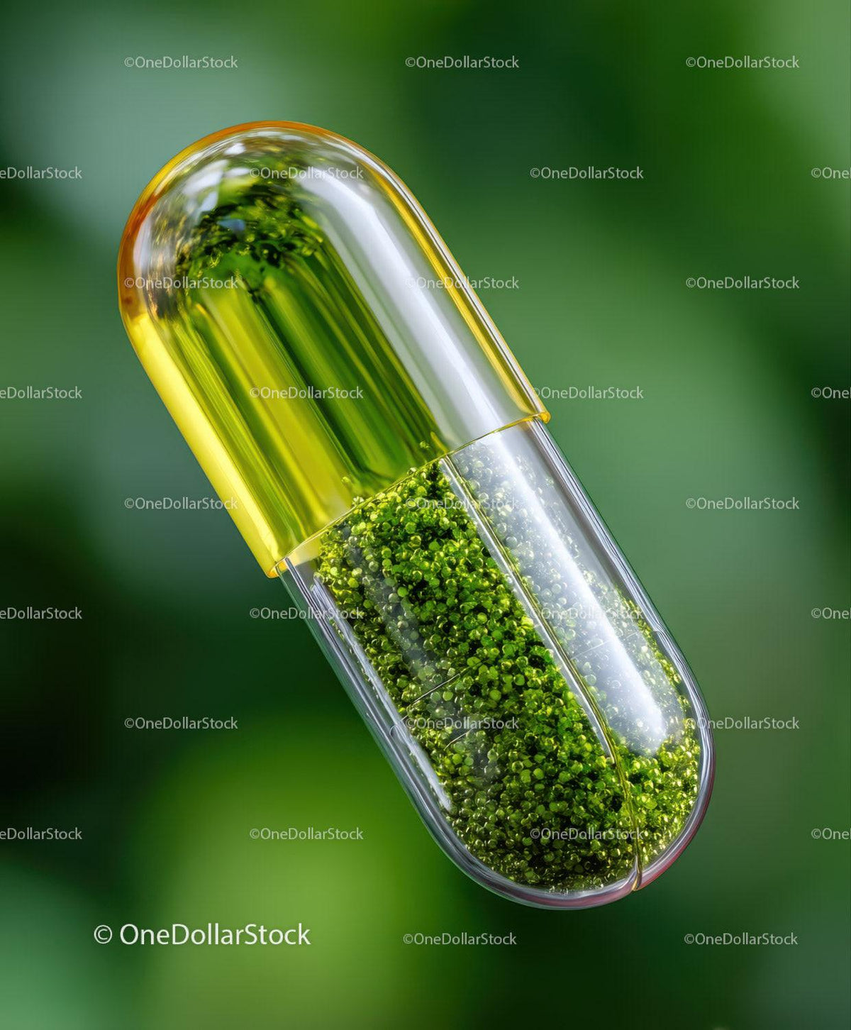Transparent capsule with small green granules inside against green background