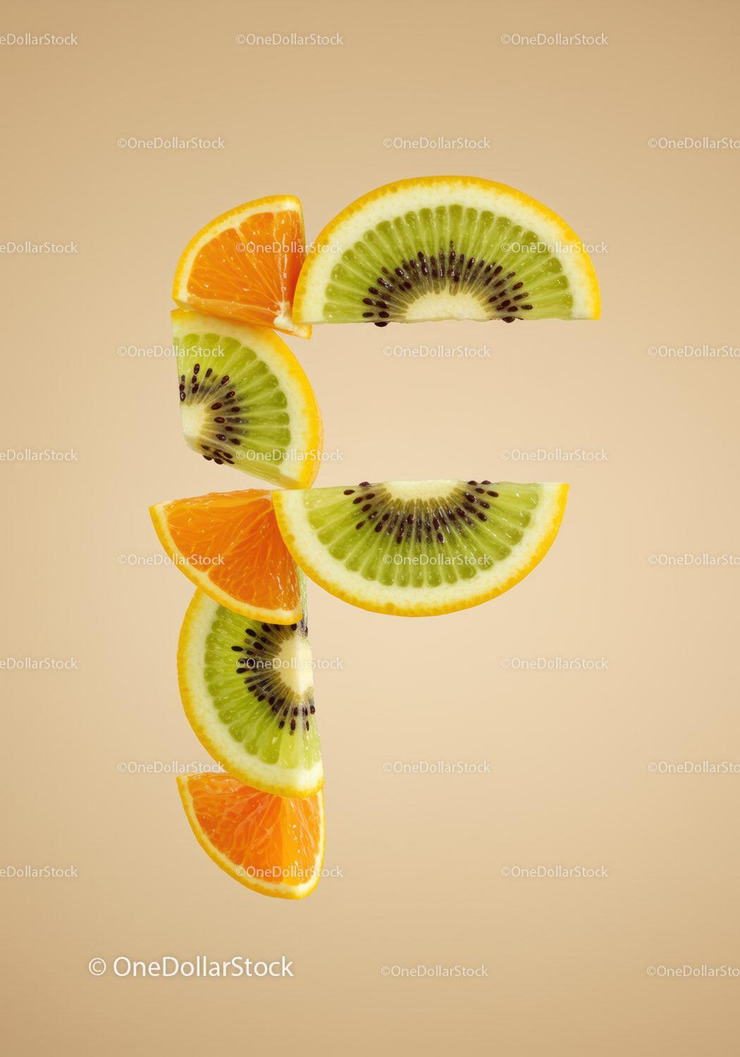 Creative Currency Symbol Made of Fresh Fruit Slices