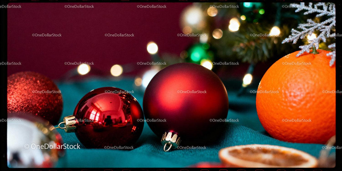Festive Red Ornaments and Orange on Holiday Decor