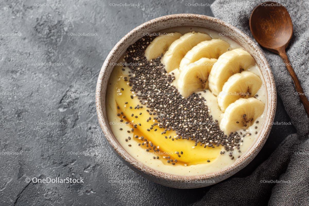Delicious Tropical Smoothie Bowl with Banana and Chia Seeds Stock Photo Bundle preview 5