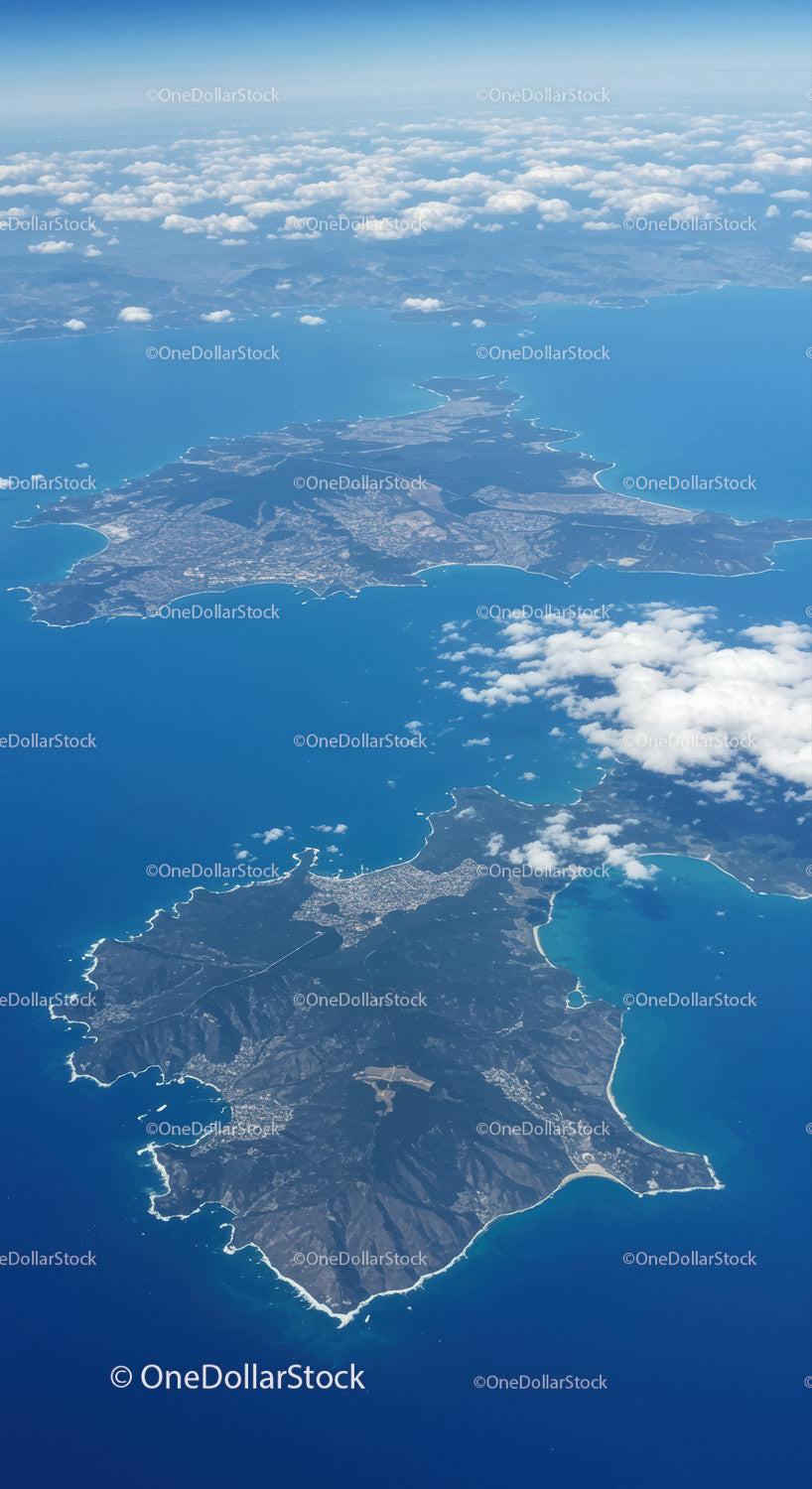 Beautiful Aerial View of Island with Rugged Coastline and Blue Ocean