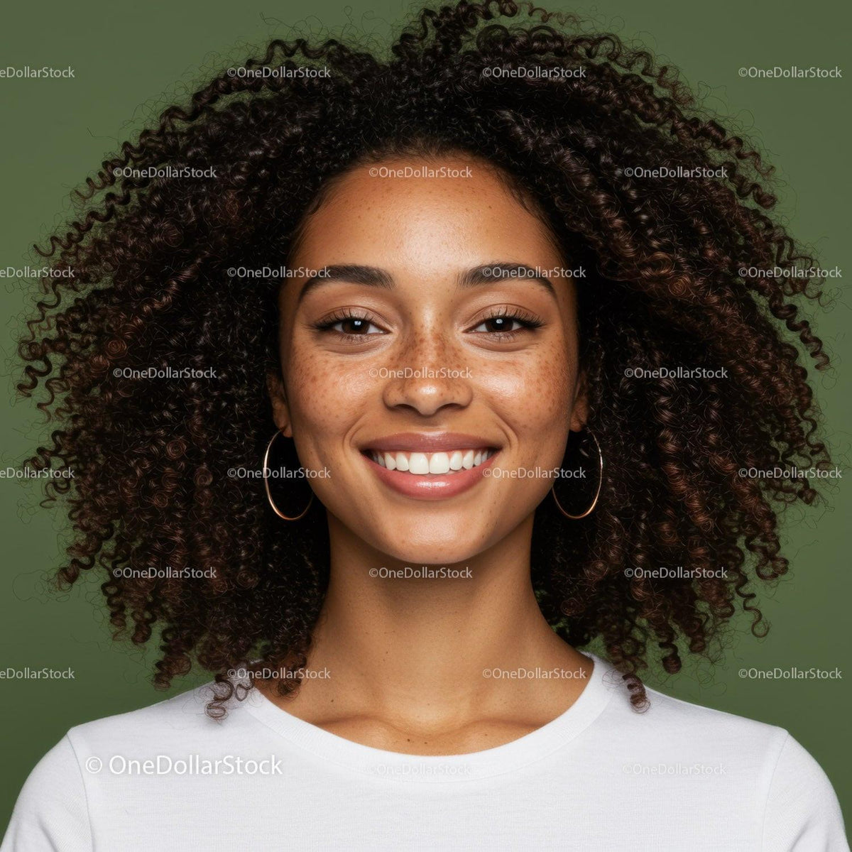 Portrait of a Smiling Woman with Curly Hair and Hoop Earrings