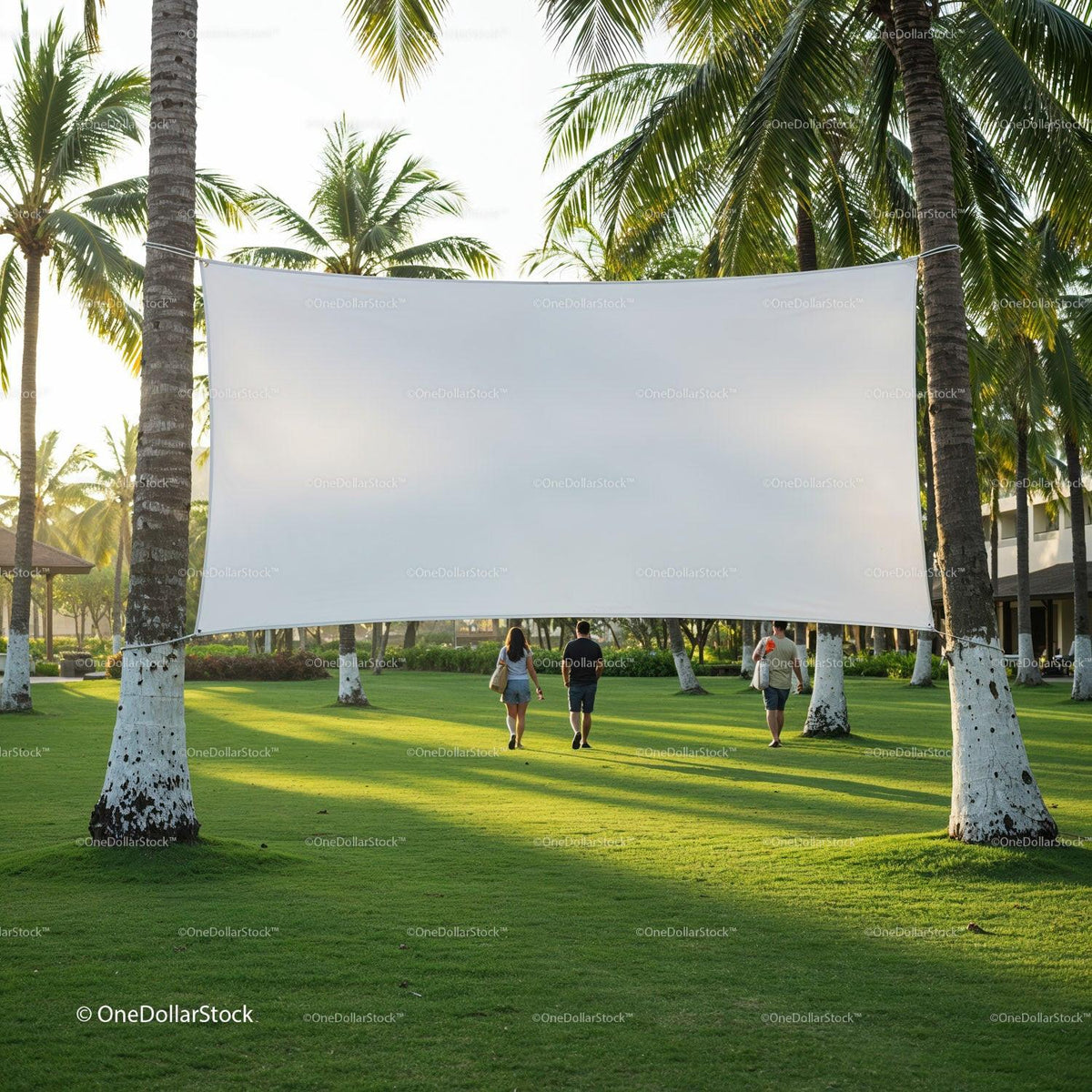 People walking toward blank outdoor movie screen in park JPG Mockup Image preview