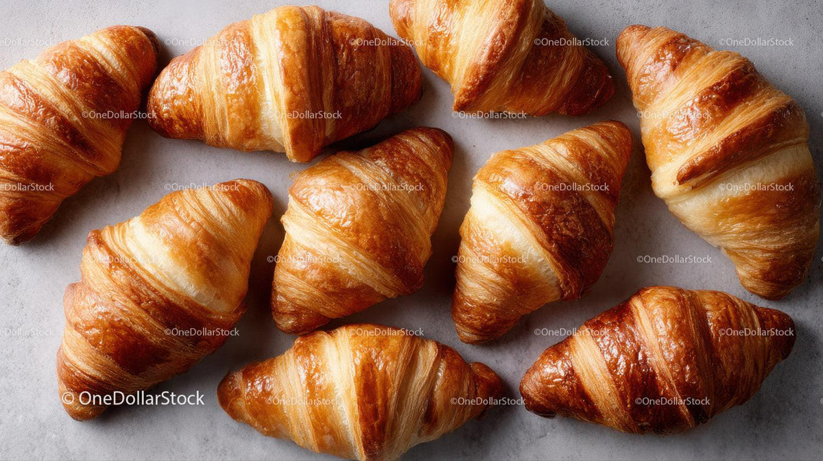 Golden Croissants on a Baking Tray for Breakfast and Brunch