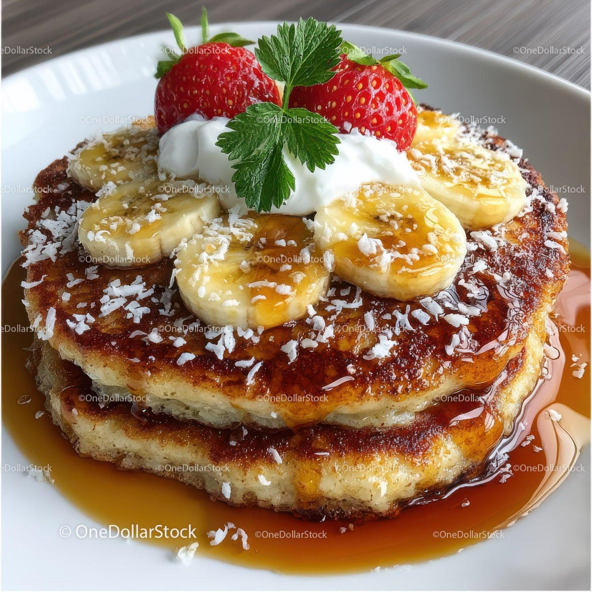 Banana and Strawberry Pancake with Whipped Cream and Caramel Syrup