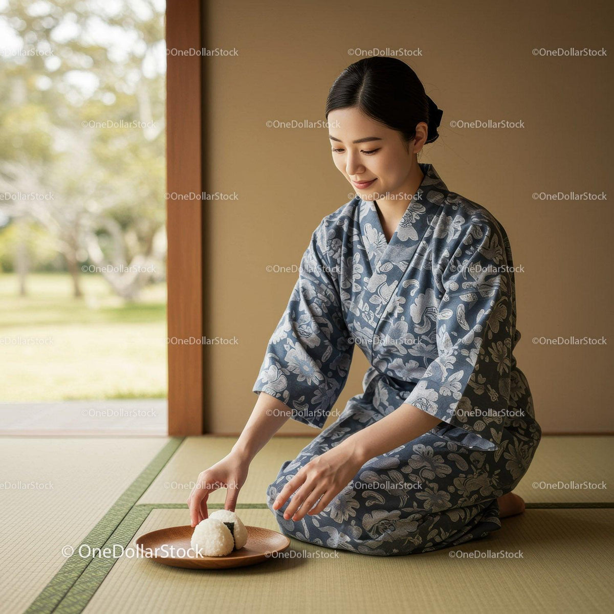 Woman in traditional kimono preparing rice balls indoors