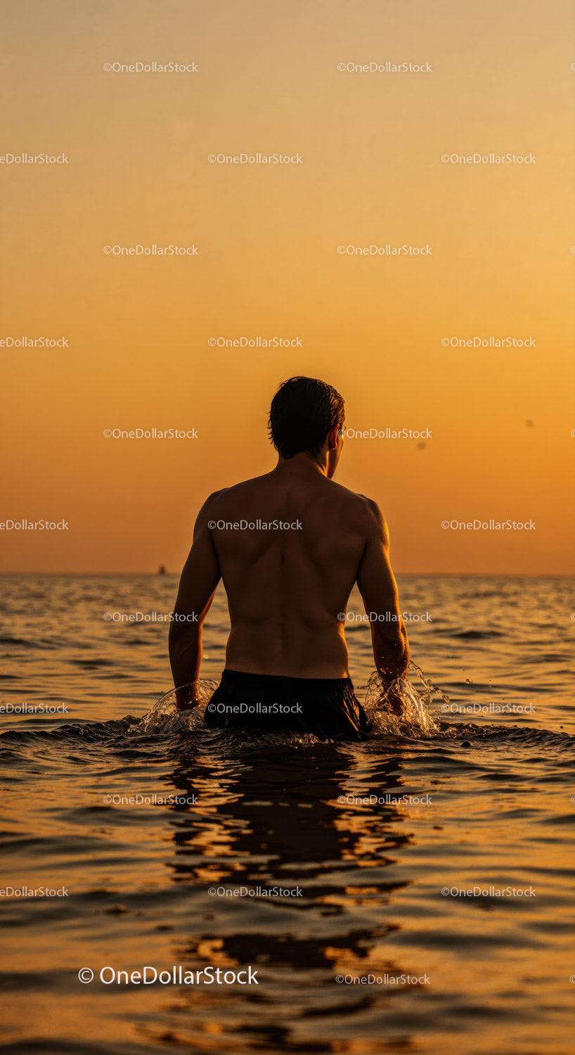 Serene Man Swimming in Ocean During Vibrant Sunset Stock Photo Bundle preview 7