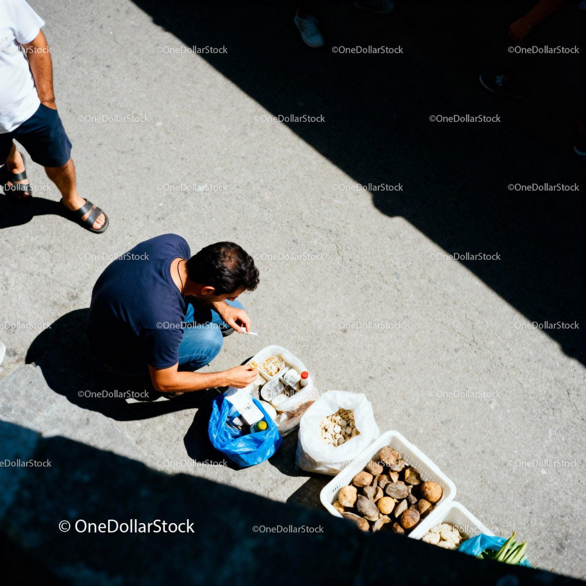 Man Preparing Street Food with Fresh Ingredients Outdoors