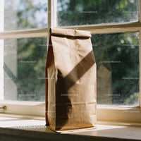Brown Paper Coffee Bag on Sunny Window Sill