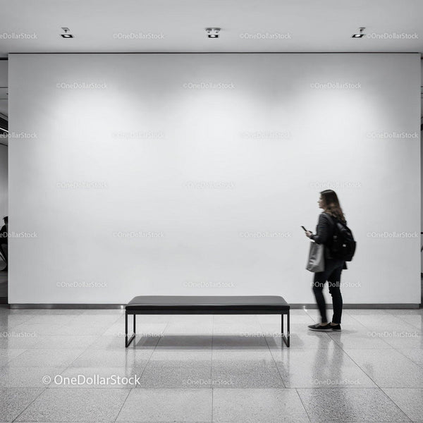 Woman walking past empty bench in modern gallery space JPG Mockup Image