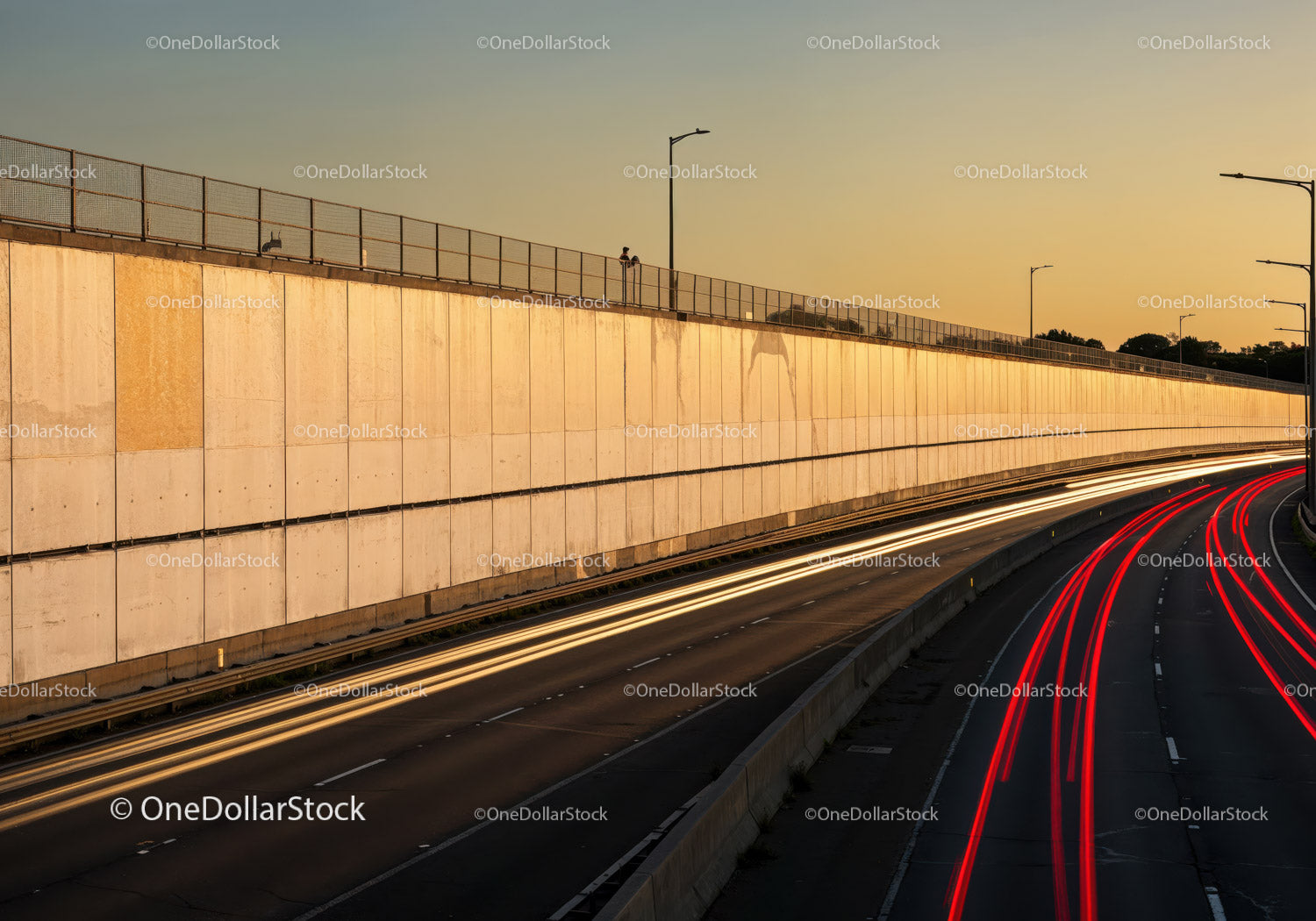 Urban Highway with Light Trails and Sunset Sky