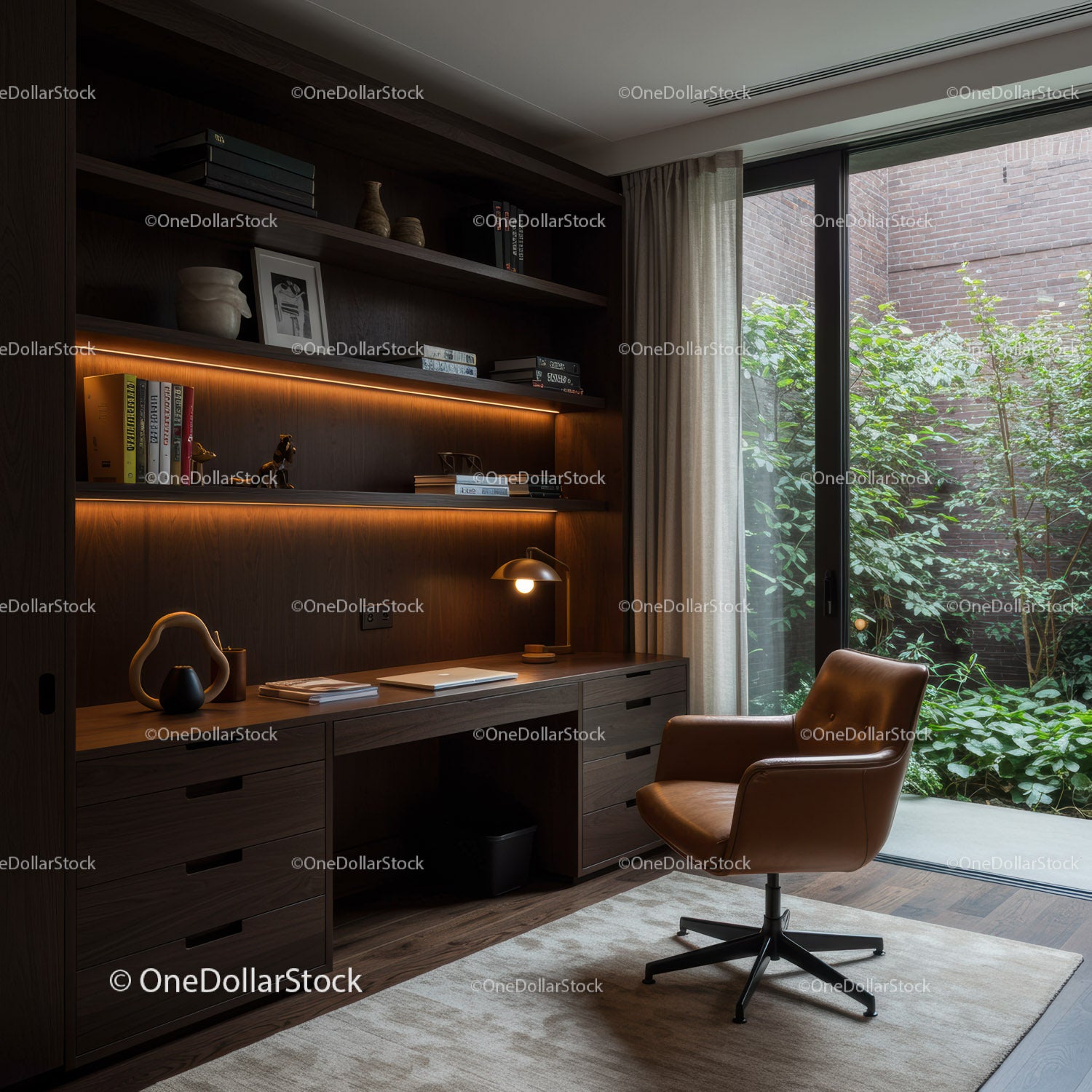 Modern home office with leather chair and garden view