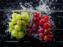 Fresh Green and Red Grapes Splashing in Water with Dynamic Motion